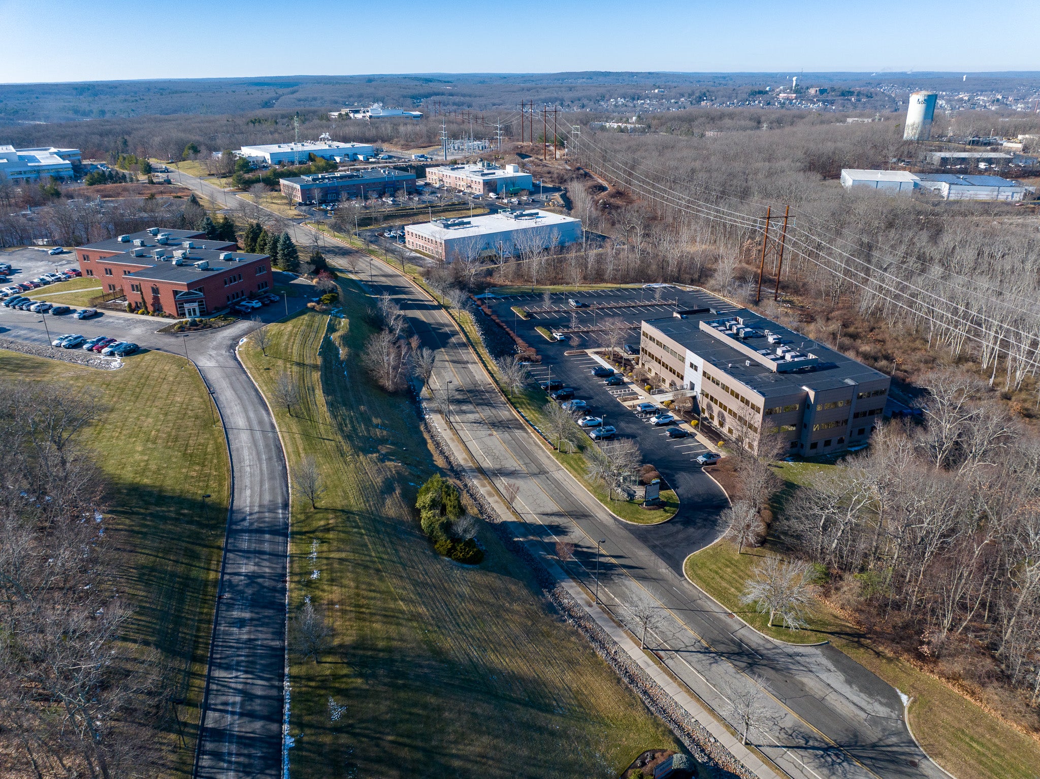 Aerial view of a commercial area with buildings and roads